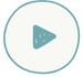 A circular play button icon with a light teal outline and border. The center contains a solid teal triangle pointing to the right, symbolizing the play function. The background inside the circle is white, mirroring the branding of our trauma clinic specializing in mental health treatment.
