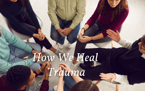 A diverse group of people sits in a circle, engaging in discussion. The phrase "How We Heal Trauma" is overlaid on the image, highlighting the importance of residential treatment in their journey to recovery.