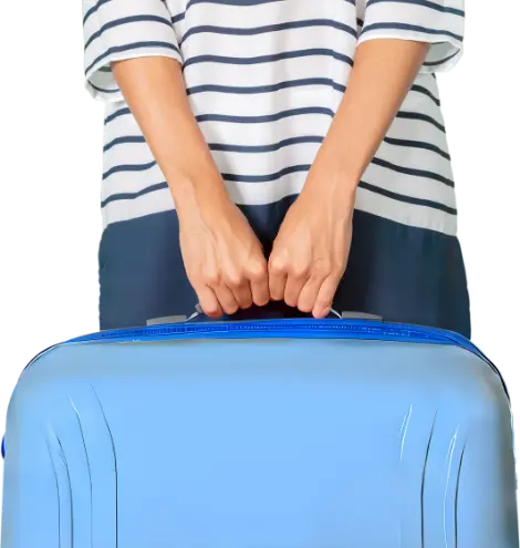 A person wearing a striped shirt is holding the handle of a blue suitcase, perhaps on their way to visit a mental health clinic. The focus is on the person's hands and suitcase, with their upper body partially visible, reflecting a journey towards self-care.